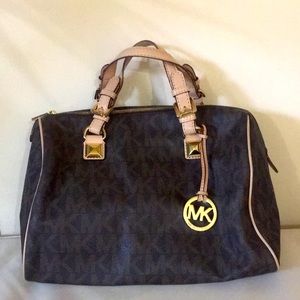 Michael Kors brown monogram speedy style bag